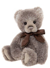 Charlie Bears Norman teddy bear from 2026 Plush Collection in taupe-grey plush with hand-embroidered nose, fully jointed and adorned with a two-tone brown bow