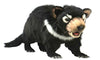Life-size Tasmanian Devil plush by Hansa with black fur, white chest markings, and realistic details.
