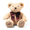Steiff Cosy Year Bear 2027 in beige plush with red satin bow and embroidered 2027 paw detail