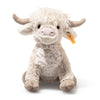 Steiff Harper Highland Cow plush soft toy with shaggy brown fur and horns, featuring the famous Steiff Button in Ear.