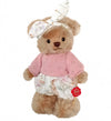 Teddy Hermann Melody limited edition caramel mohair teddy bear wearing a pink knitted sweater, floral trousers and hairband