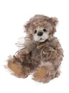 Charlie Bears Isabelle Collection Camelot teddy bear with curly brown mohair, bow, and key necklace.