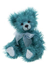 Charlie Bears Whizz teddy bear in bright turquoise long-pile plush with a sheer light blue bow and sculpted paw pads, 32cm.