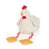 Clucky the Chicken plush toy with shaggy cream fur, striped red and cream legs, and bright orange feet and beak from the Good Friends Farm collection