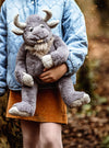 Cobblestone plush giant from Charlie Bears Bear & Me 2025 collection with soft grey fur, curved horns, and a kind, expressive face.