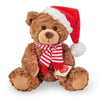 Plush Christmas Teddy Bear by Teddy Hermann wearing red festive hat and green scarf