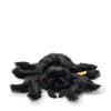 Steiff Cobweb Spider plush toy, 14cm with black fur, eight hairy legs, and red glittering eyes, from the Steiff Friends range.