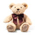 Steiff Cosy Year Bear 2027 in beige plush with red satin bow and embroidered 2027 paw detail