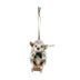 Steiff Sledding Hedgehog Ornament made of tipped mohair with holly bowtie on a wooden sled