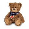 Brown Teddy Hermann teddy bear wearing a blue neckerchief, soft plush and cuddly design