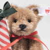 Teddy bear with candy cane ornament | Steiff Limited Edition